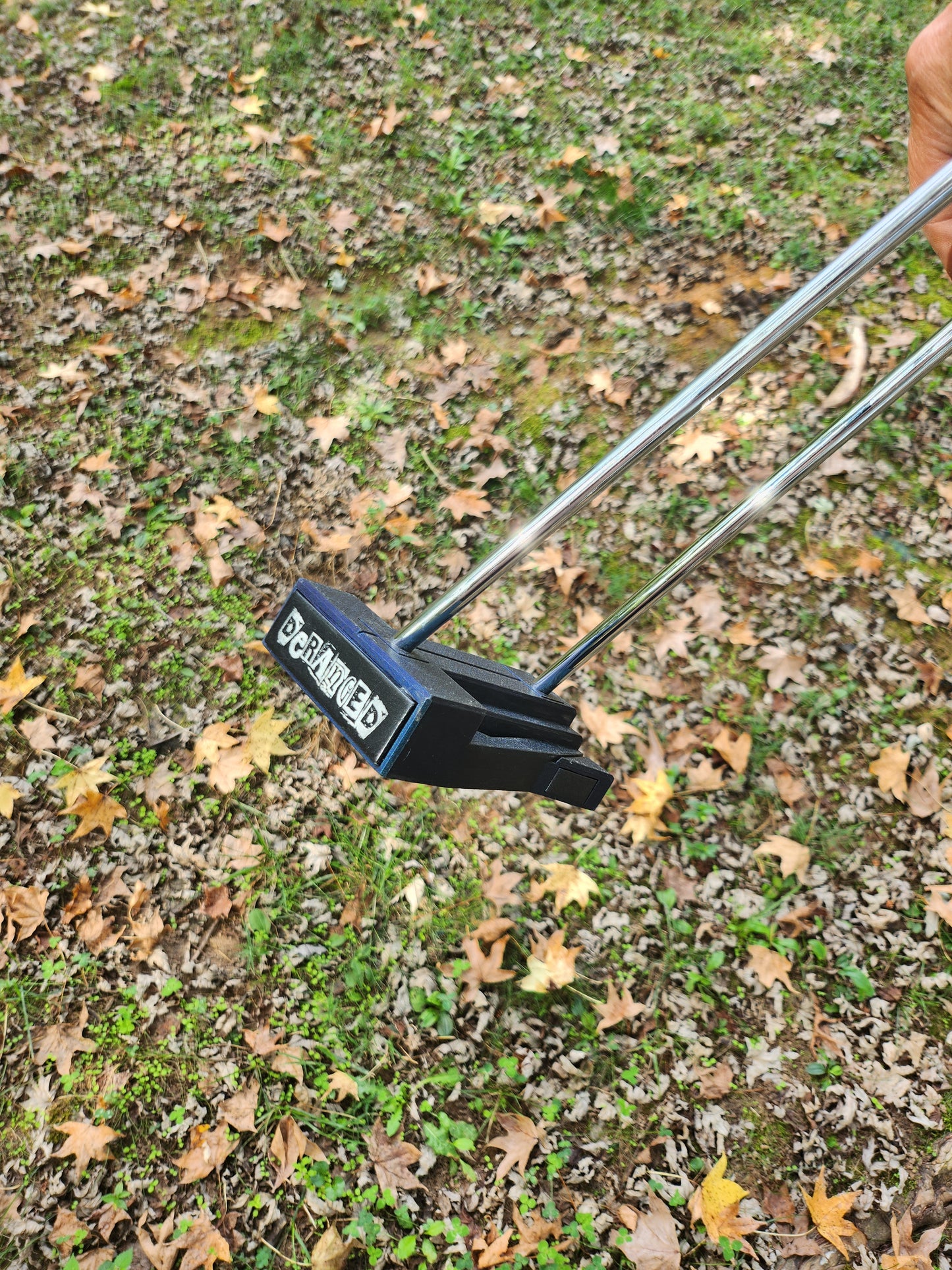 Bi-Polar dual shafted putter